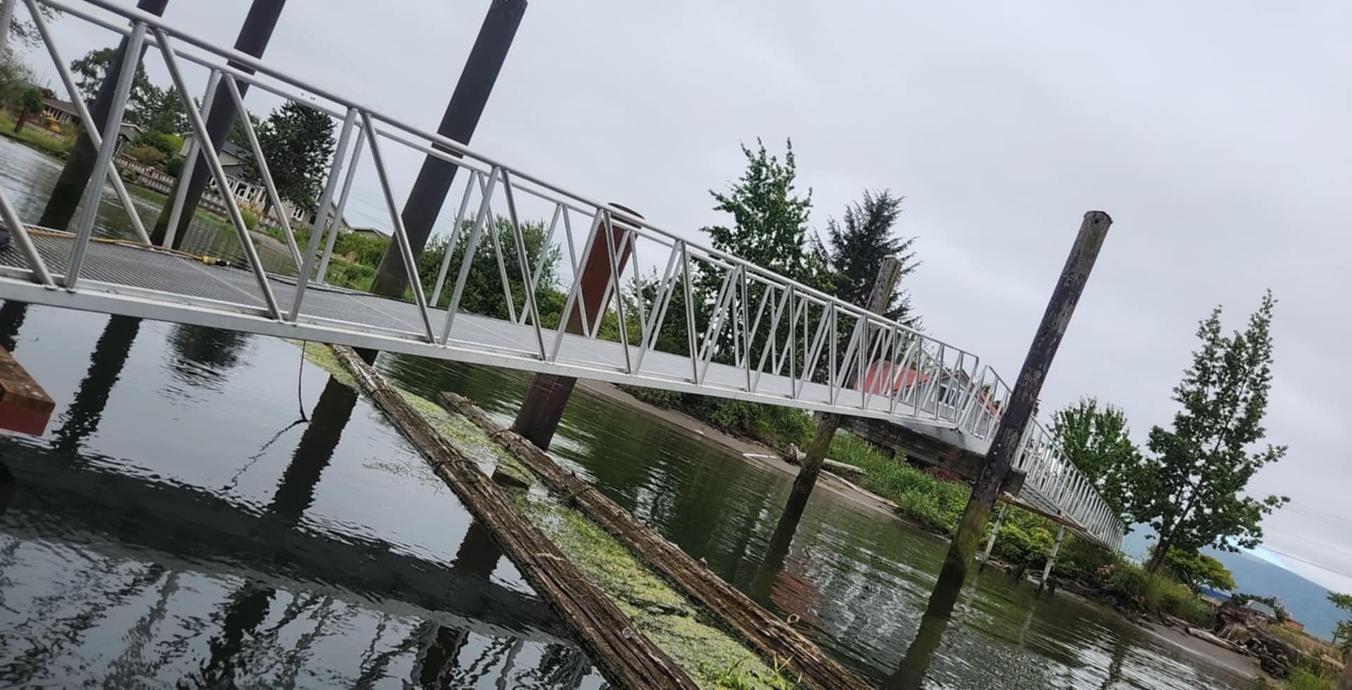 Custom aluminum truss-style gangway over the water